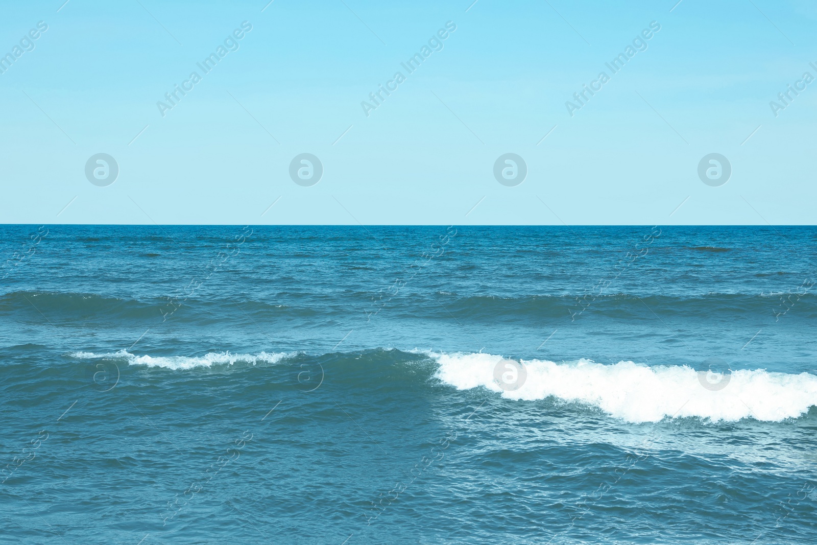 Photo of Picturesque view of beautiful sea and blue sky on sunny day