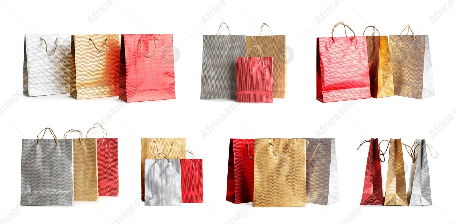 Image of Set of paper shopping bags on white background