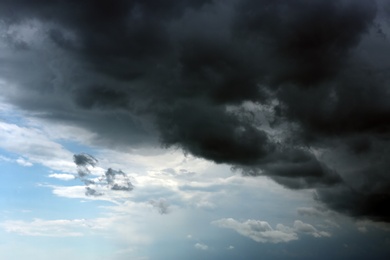 Photo of Sky with heavy rainy clouds on grey day