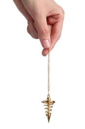 Photo of Woman holding golden pendulum with chain on white background, closeup. Hypnosis session