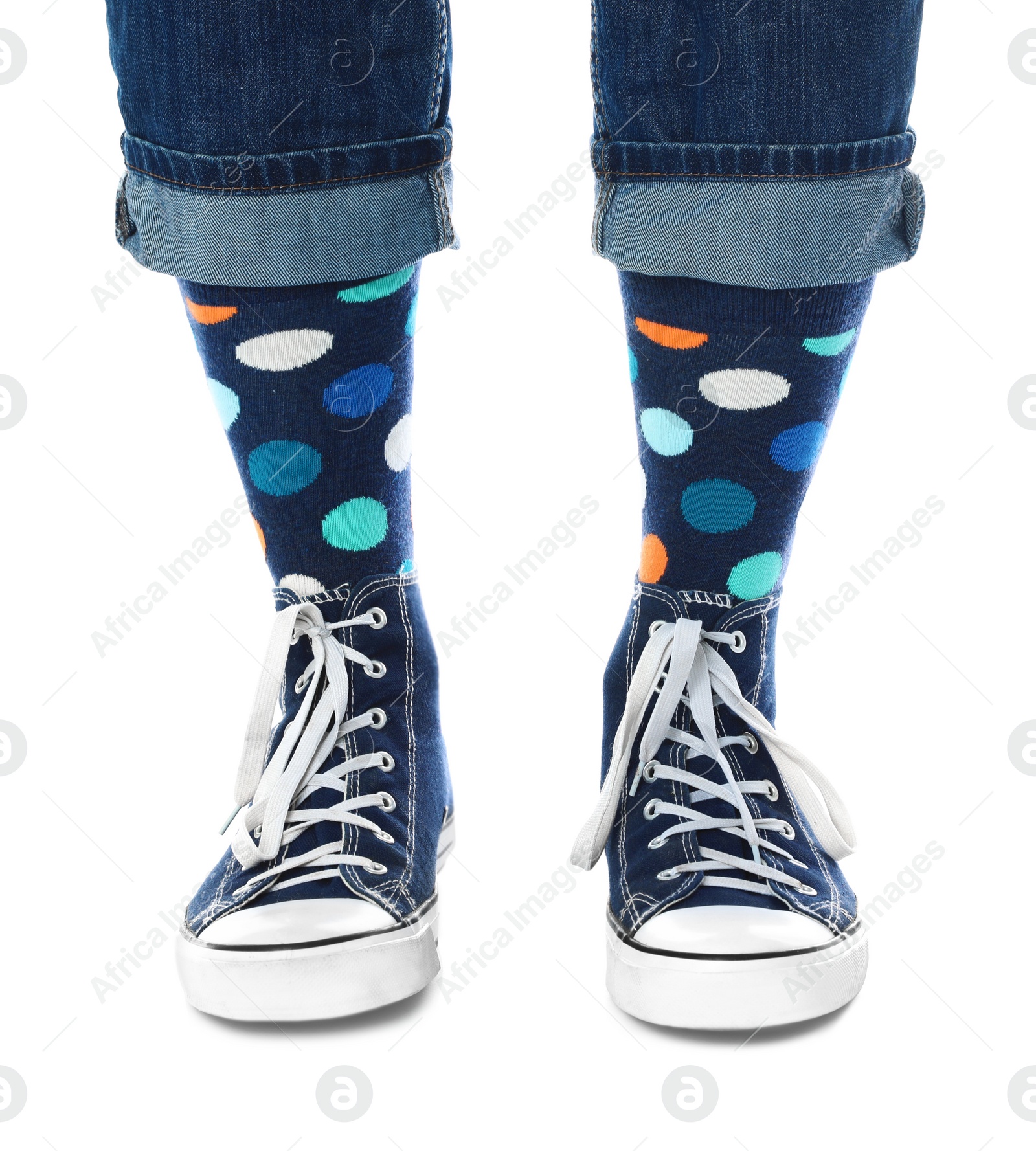 Photo of Person wearing stylish socks and shoes on white background, closeup