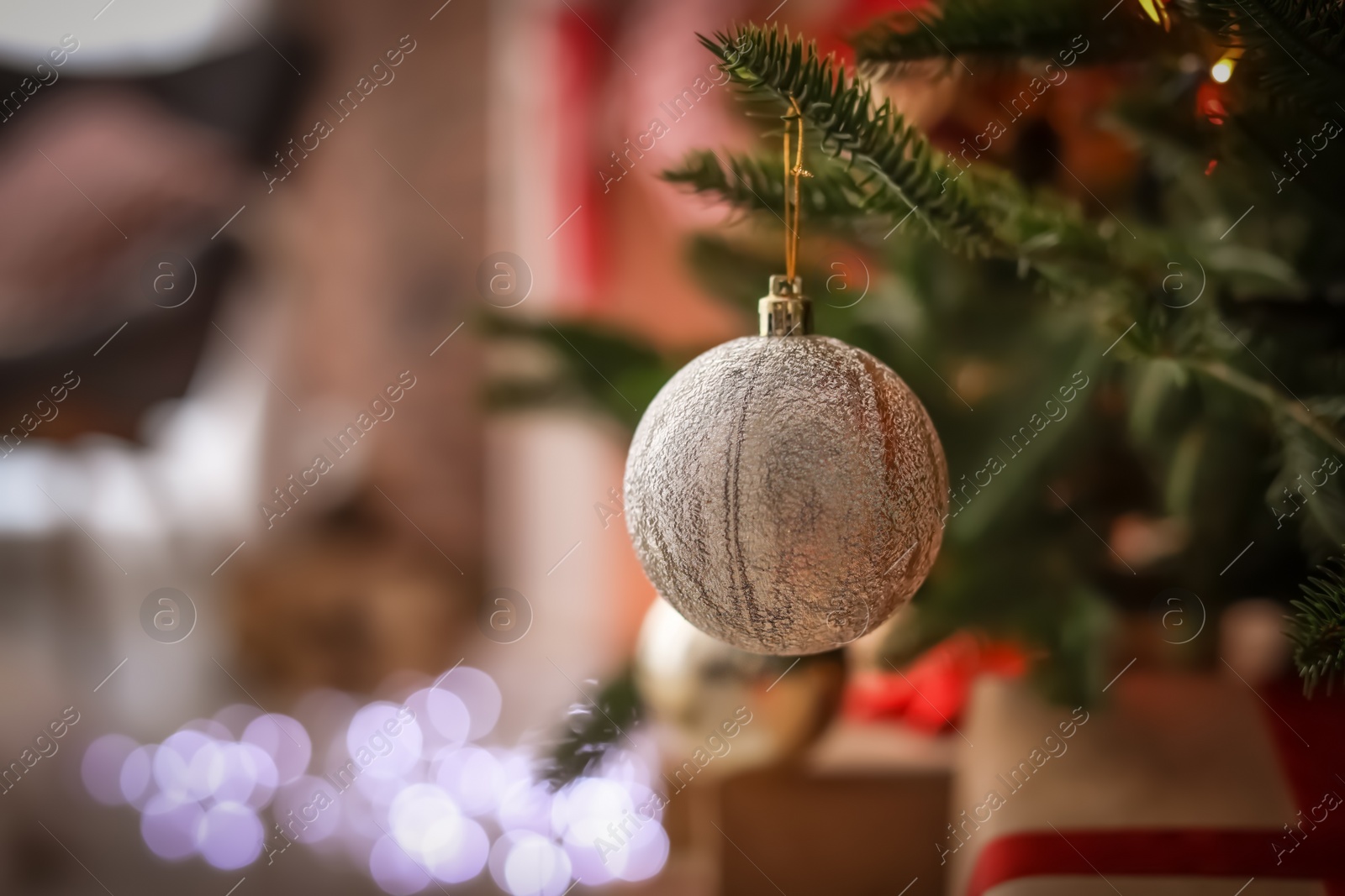 Photo of Christmas tree with stylish decor indoors, closeup