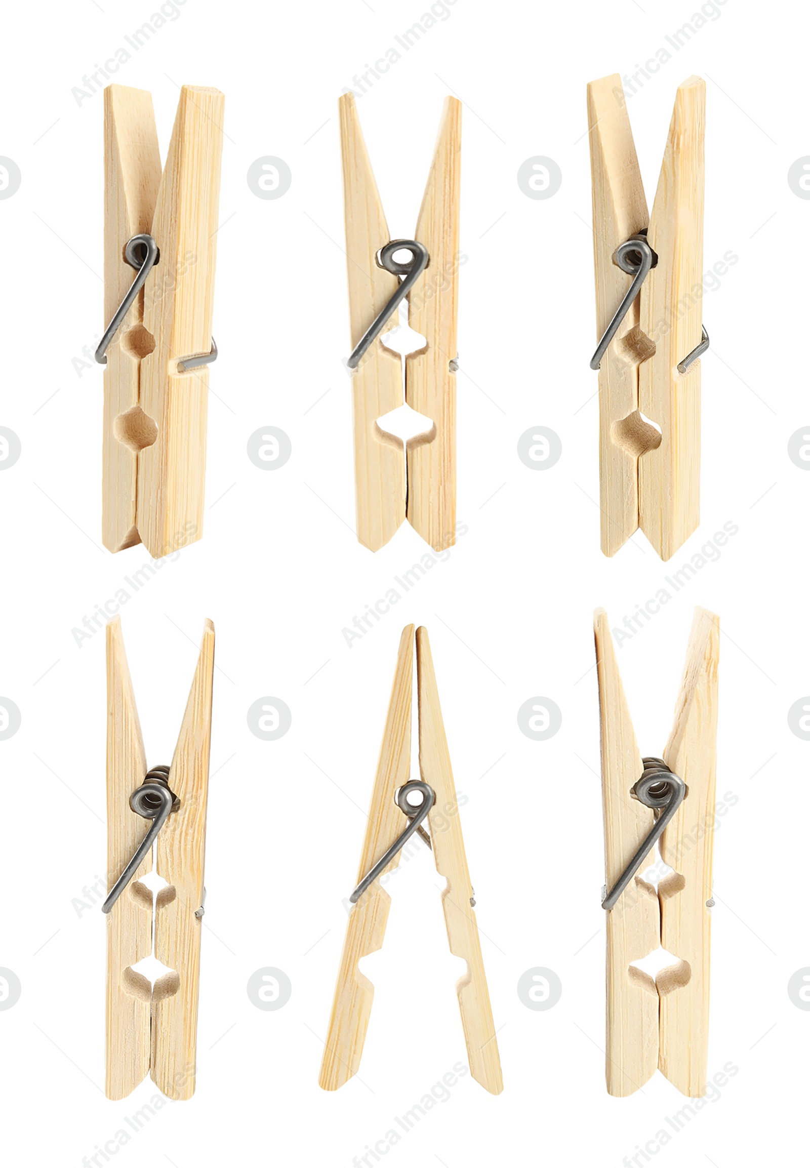 Image of Set with wooden clothespins on white background