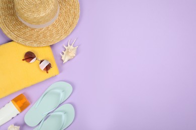 Photo of Flat lay composition with beach objects on violet background, space for text