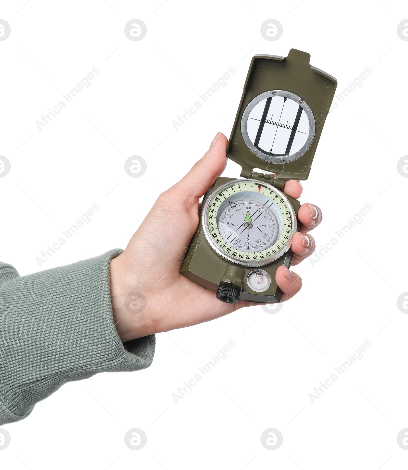 Photo of Woman holding compass on white background, closeup