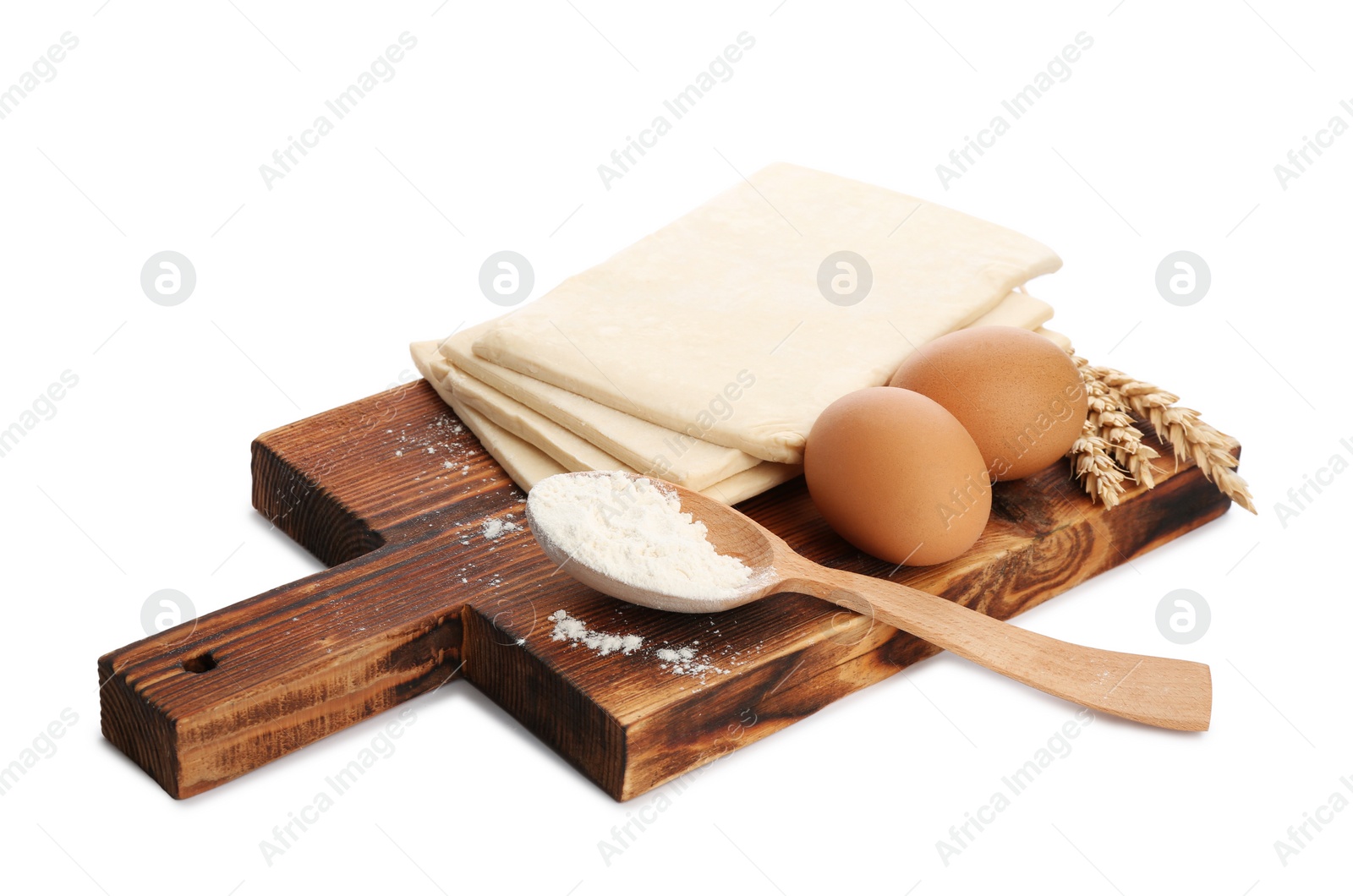 Photo of Composition with fresh dough on white background. Puff pastry