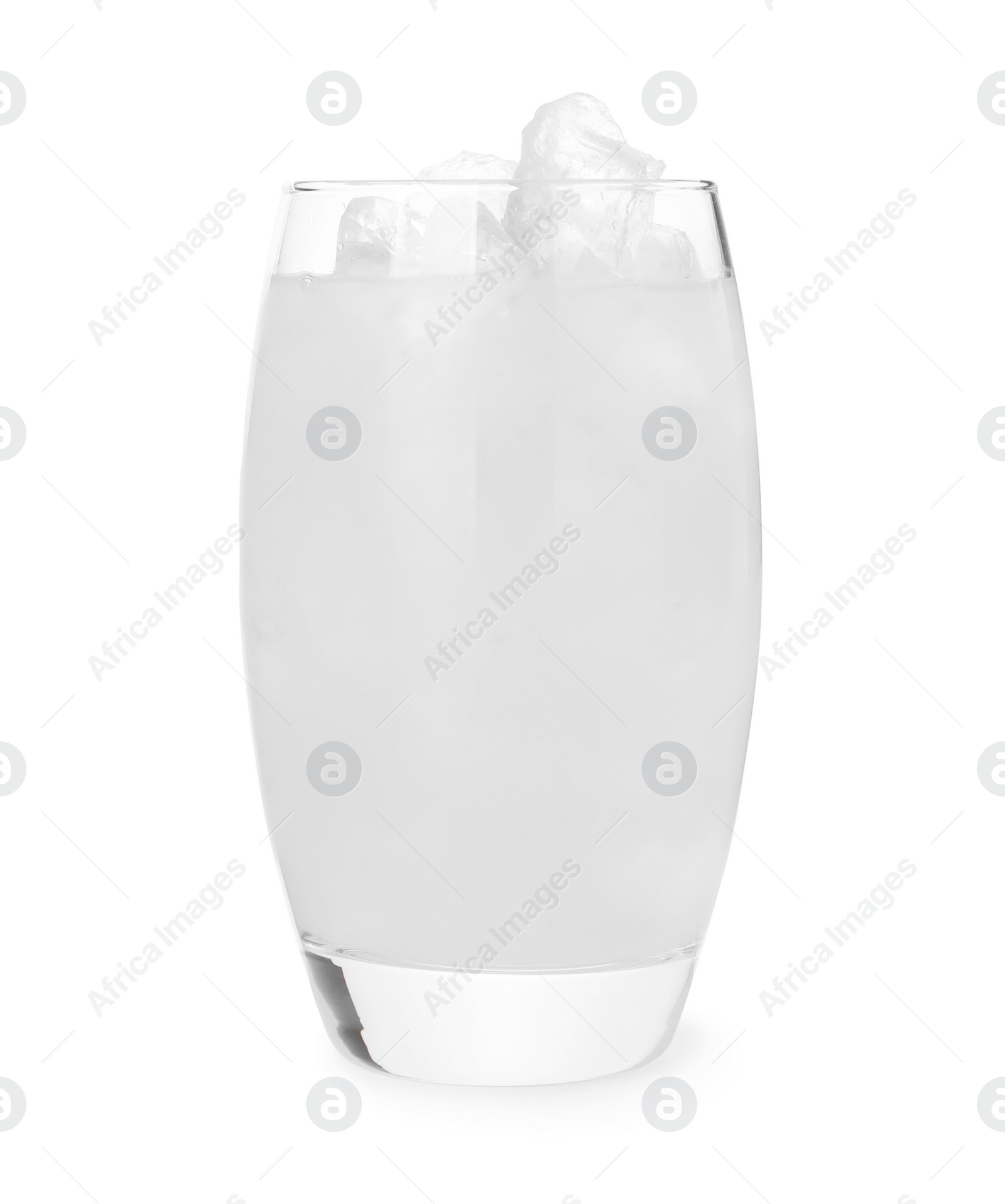 Photo of Glass of coconut water with ice cubes isolated on white