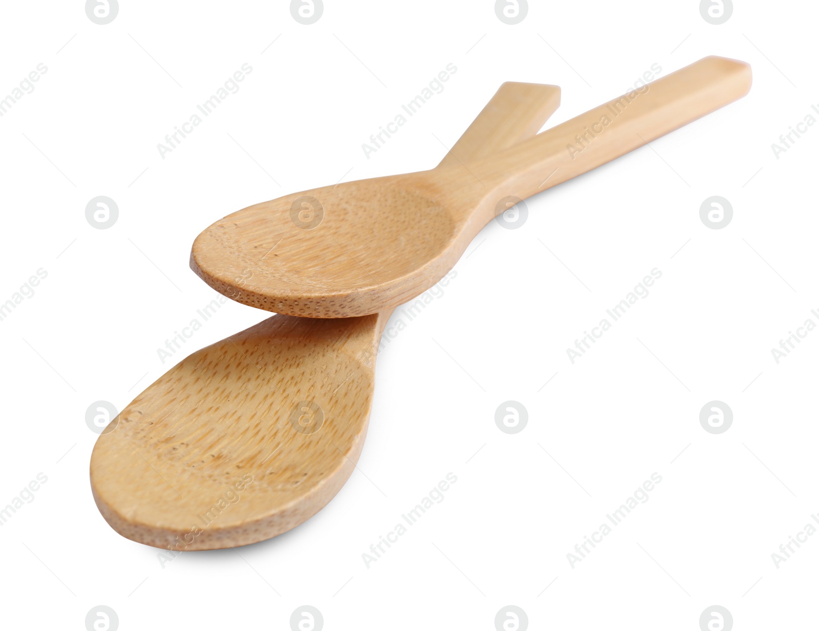 Photo of Two new wooden spoons on white background