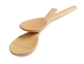 Two new wooden spoons on white background