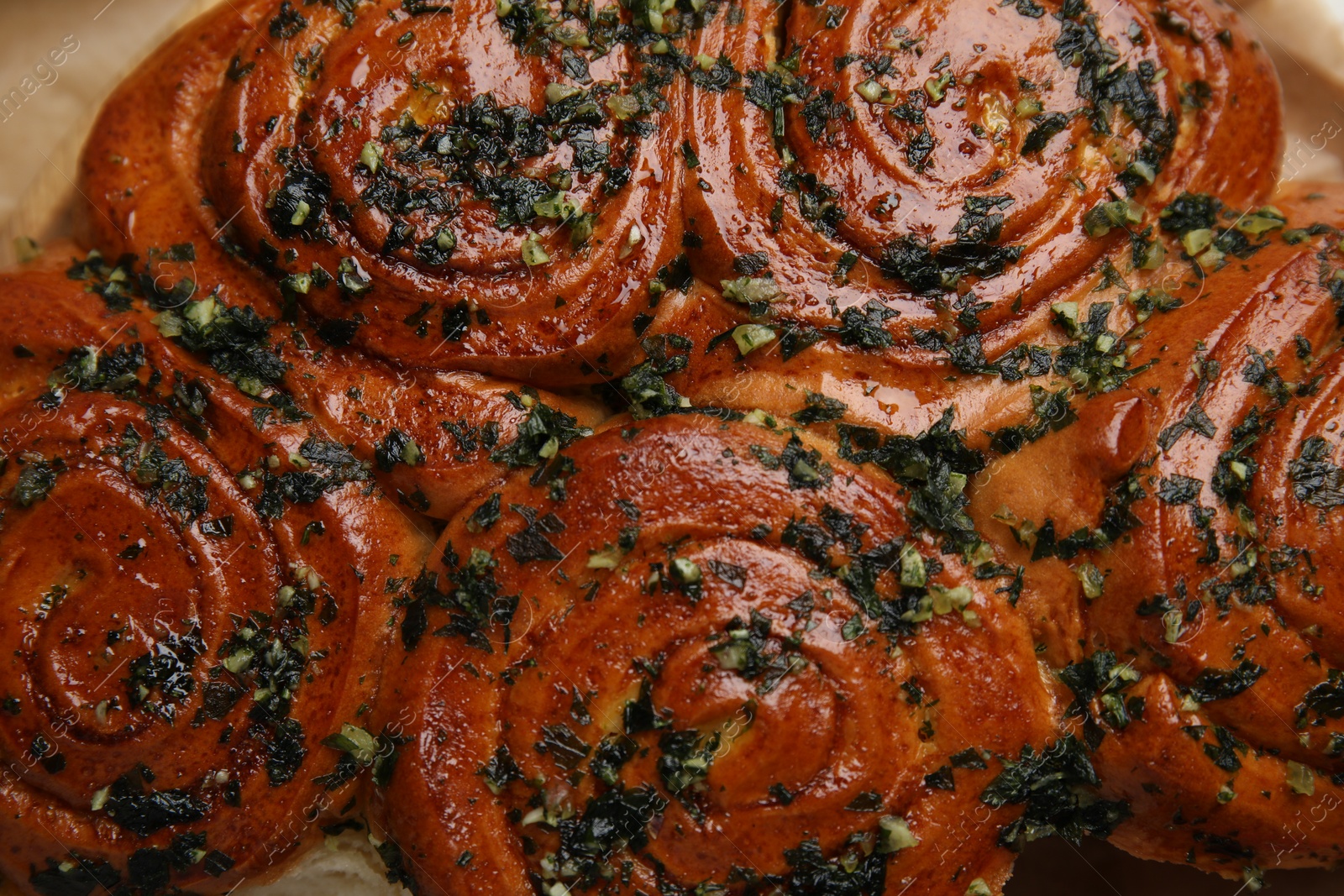 Photo of Traditional Ukrainian bread (Pampushky) with garlic, top view