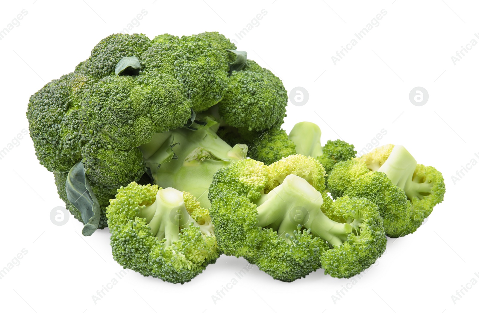 Photo of Pile of fresh raw green broccoli isolated on white