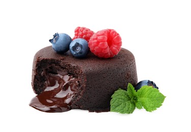 Photo of Delicious chocolate fondant, berries and mint isolated on white
