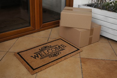 Parcels delivered on mat near front door