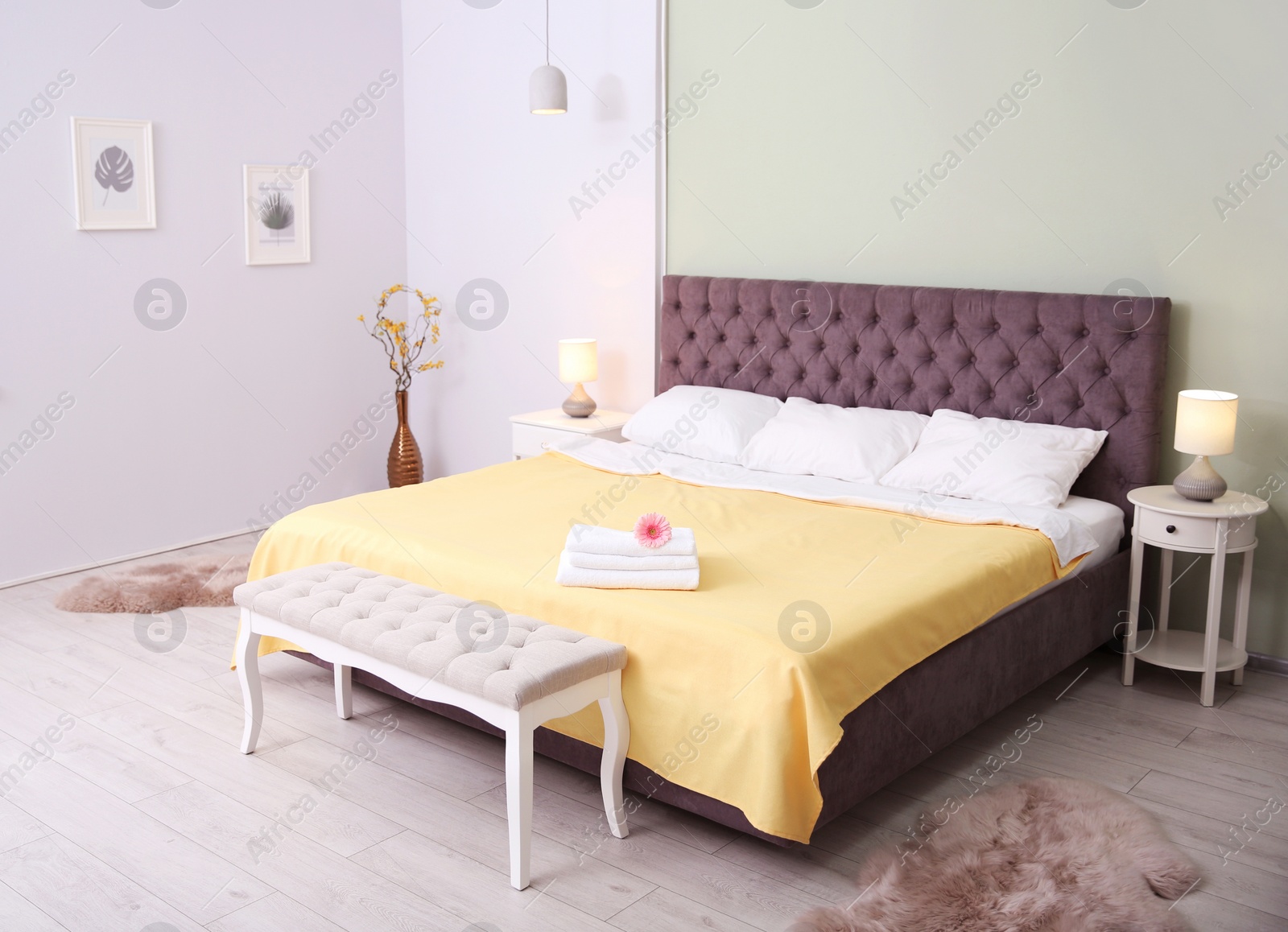 Photo of Elegant hotel room interior with comfortable bed