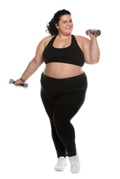 Photo of Overweight woman with dumbbells on white background