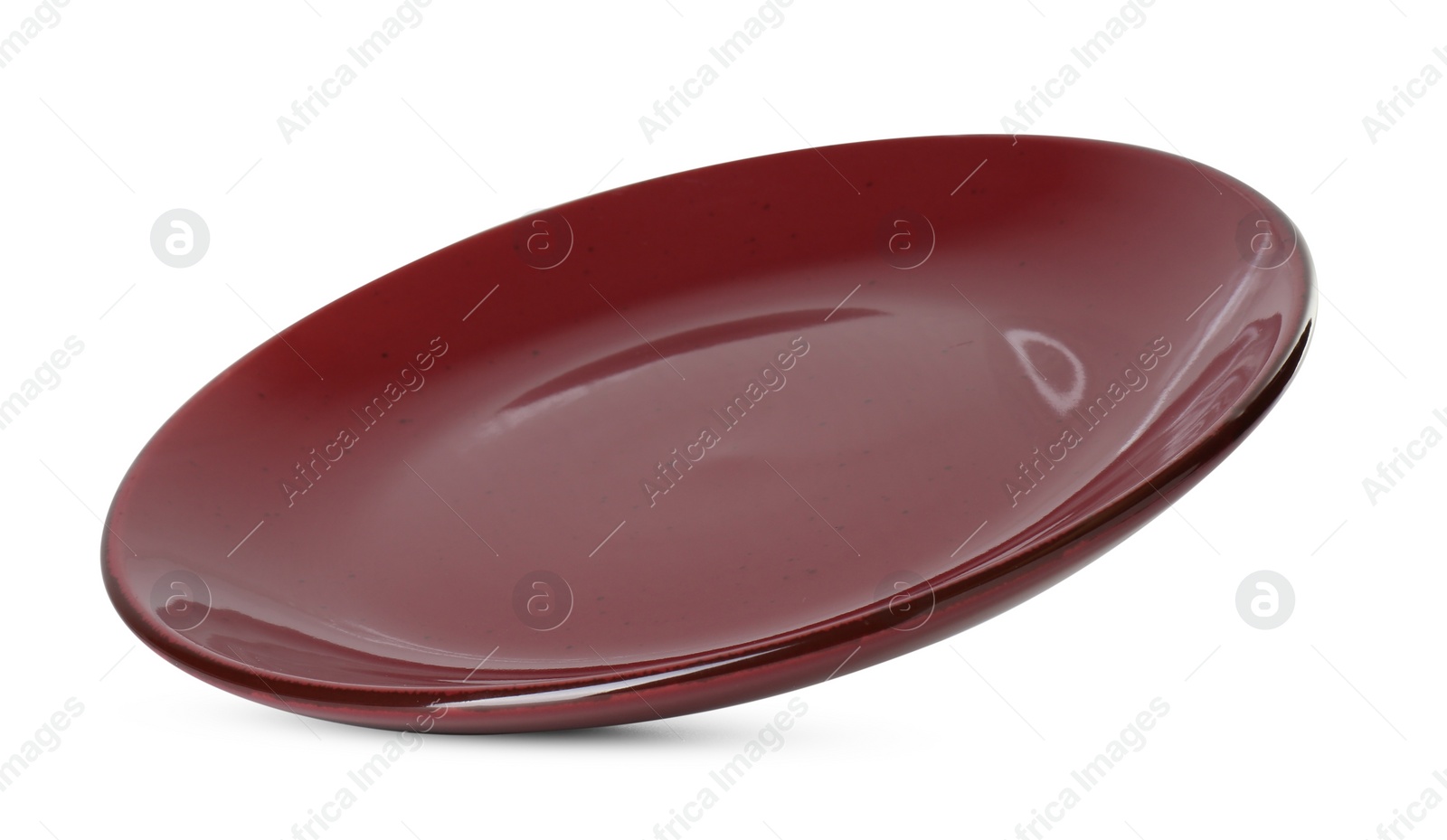 Photo of One beautiful burgundy plate isolated on white