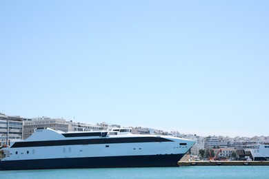 Photo of Picturesque view of port with modern boats on sunny day