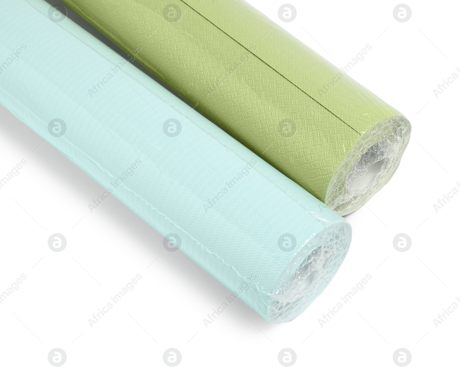 Photo of Two colorful wallpaper rolls isolated on white