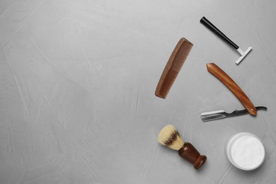 Set of men's shaving tools on light gray table, flat lay. Space for text