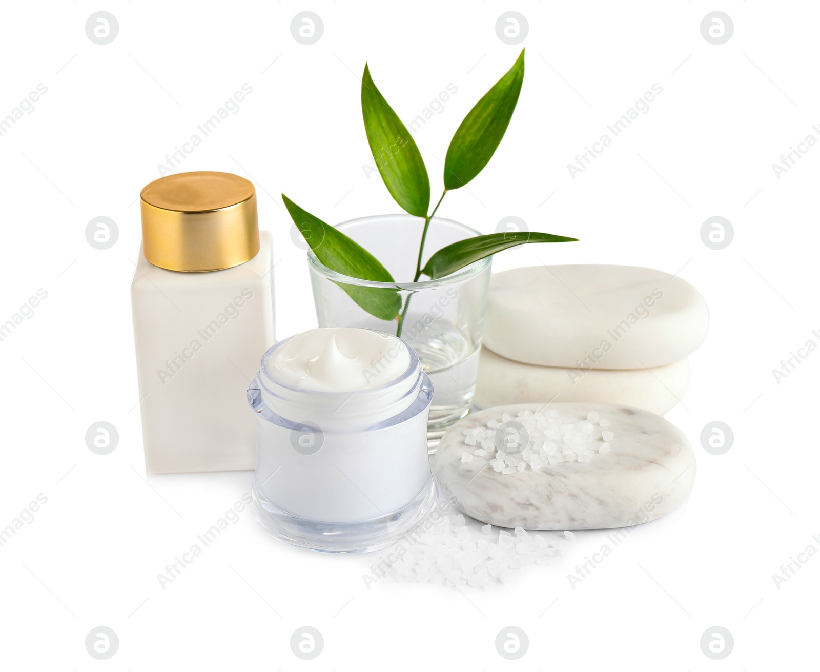 Photo of Composition with cream and spa stones on white background