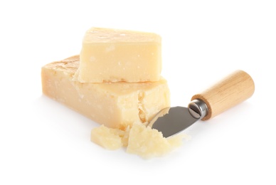 Pieces of Parmesan cheese and knife on white background