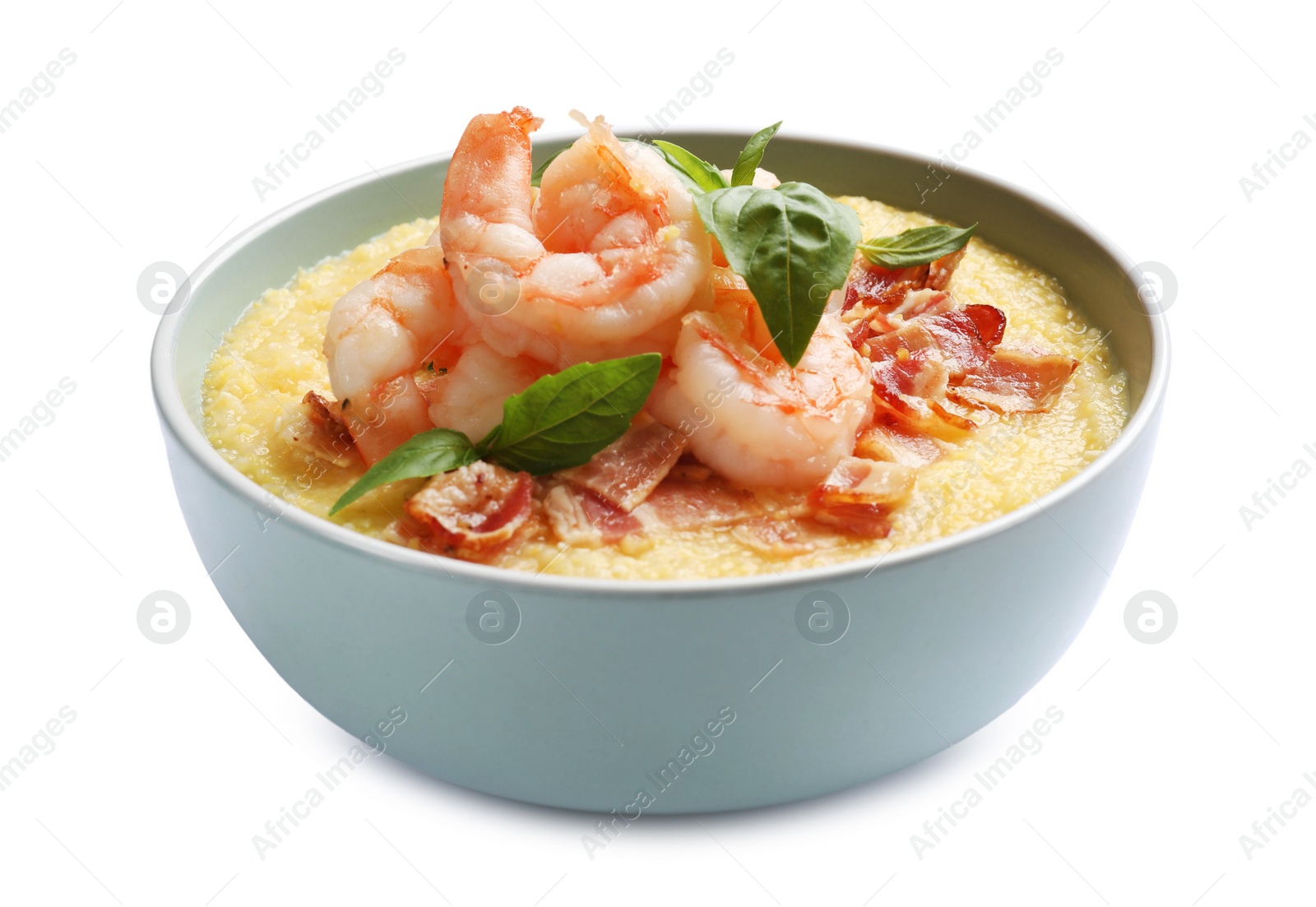 Photo of Fresh tasty shrimps, bacon, grits and basil in bowl isolated on white