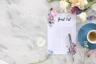 Photo of Guest list, coffee, pen and beautiful flowers on light textured table, flat lay. Space for text