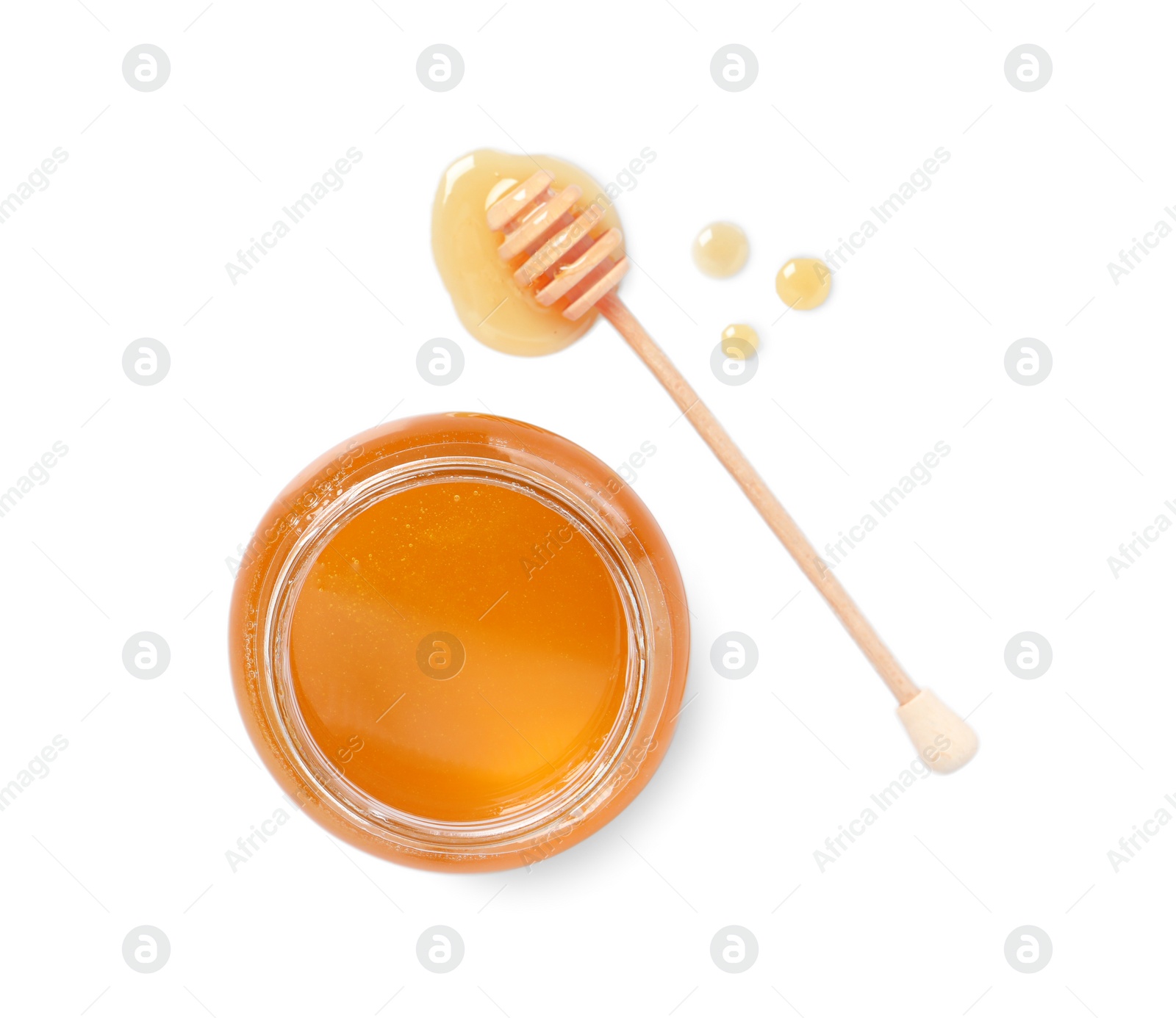 Photo of Tasty honey in glass jar and dipper isolated on white, top view. Space for text