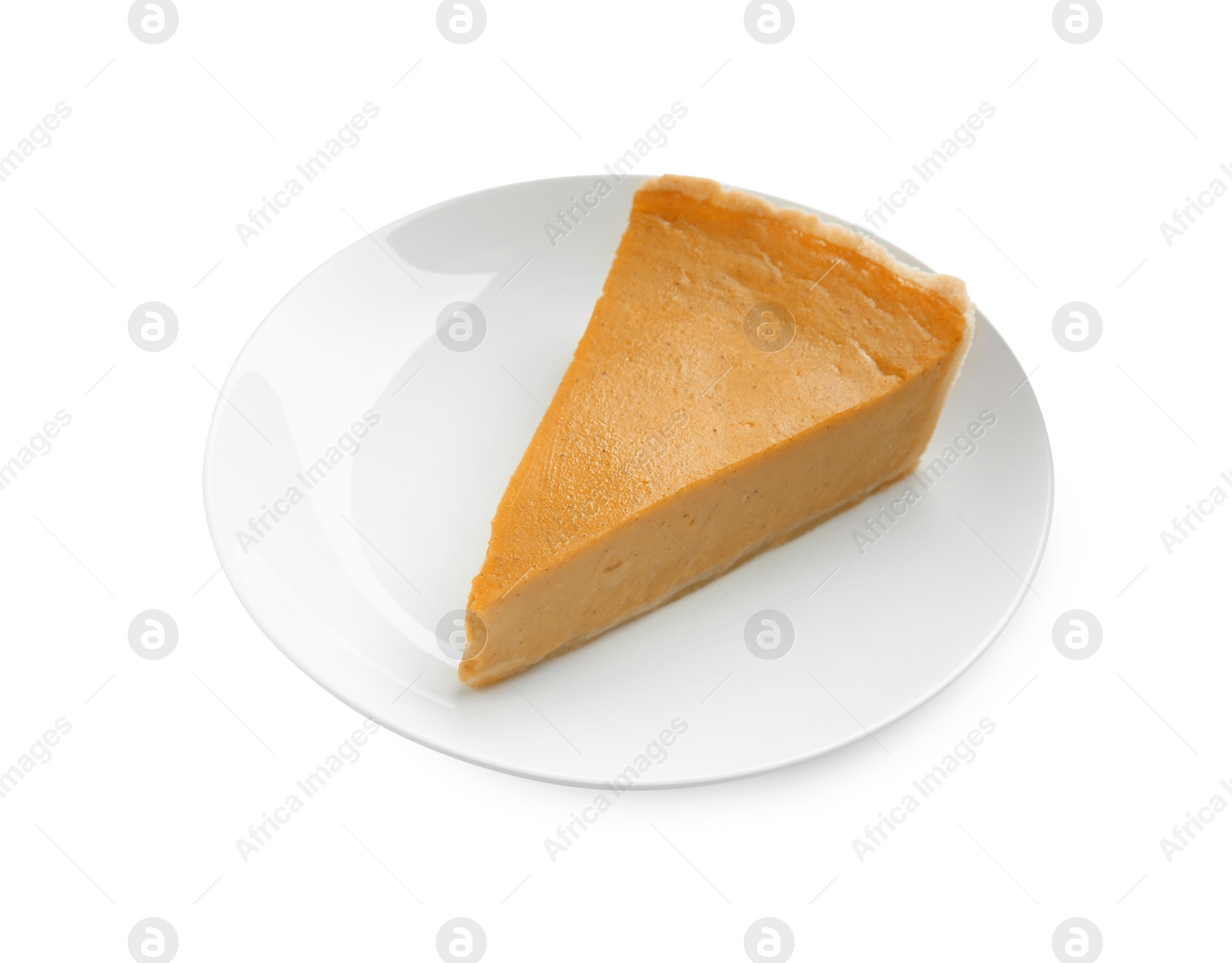 Photo of Plate with piece of delicious pumpkin pie isolated on white