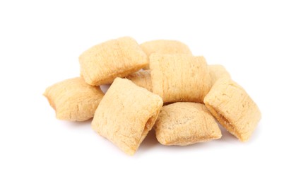 Photo of Pile of tasty corn pads on white background, closeup. Healthy breakfast cereal