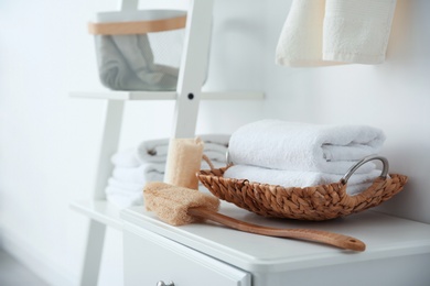 Clean towels and sponges on table indoors