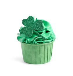 Photo of St. Patrick's day party. Tasty cupcake with green clover leaf topper and cream isolated on white