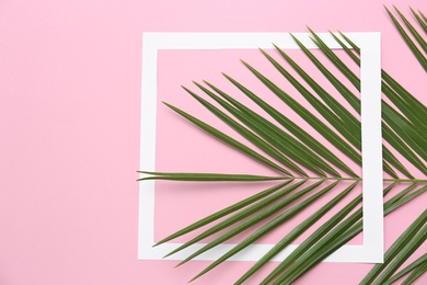 Photo of Beautiful composition with tropical leaf on color background, top view