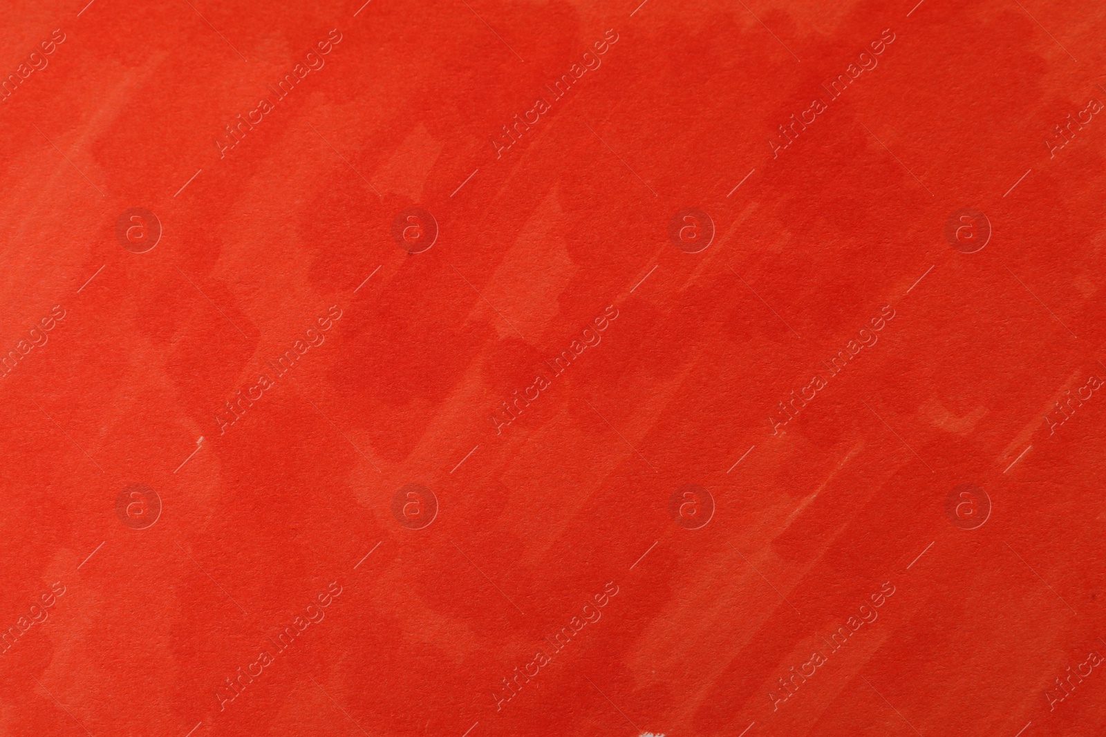 Photo of Abstract painting drawn with dark orange marker as background, top view
