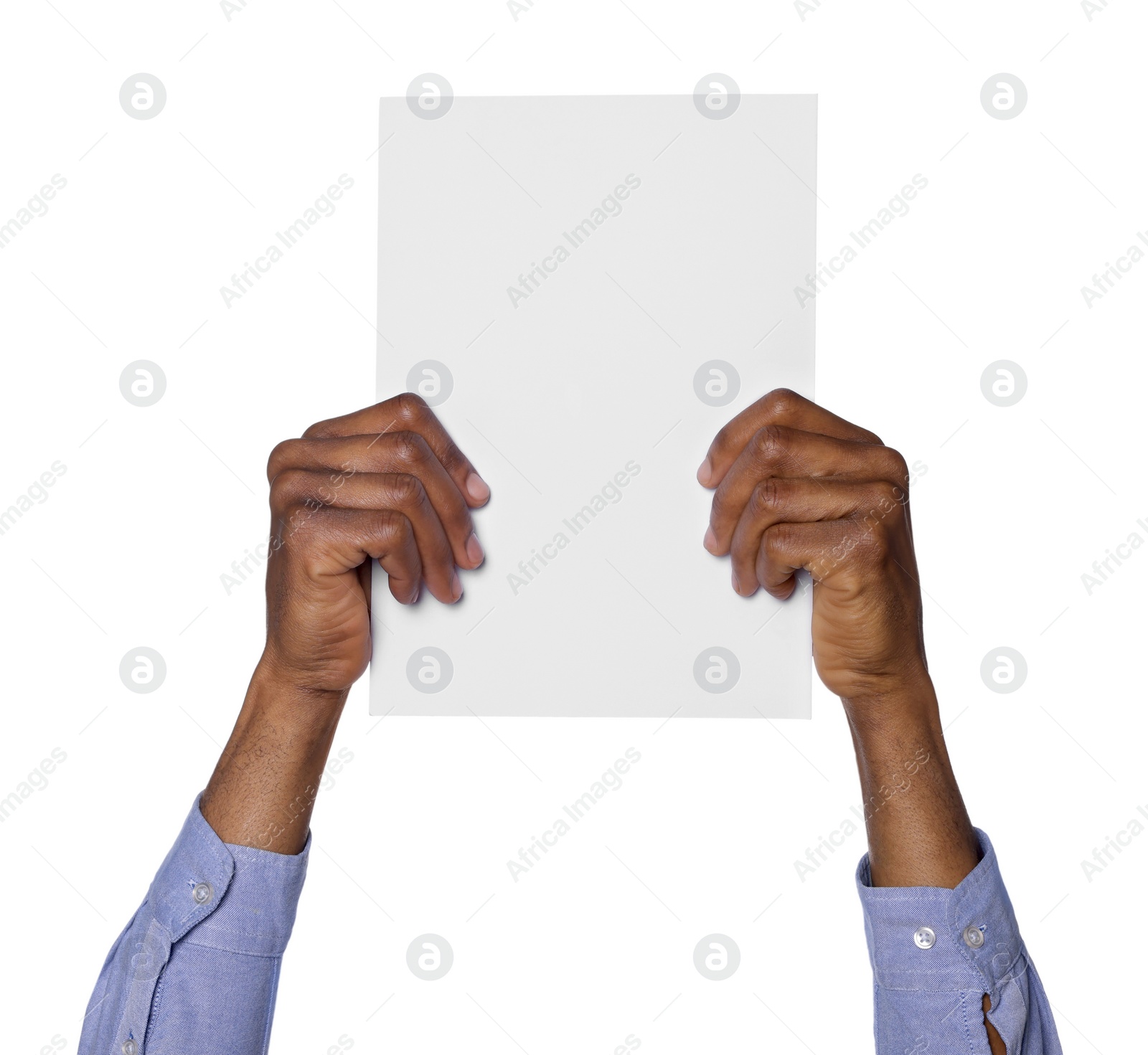 Photo of African American man holding sheet of paper on white background, closeup. Mockup for design