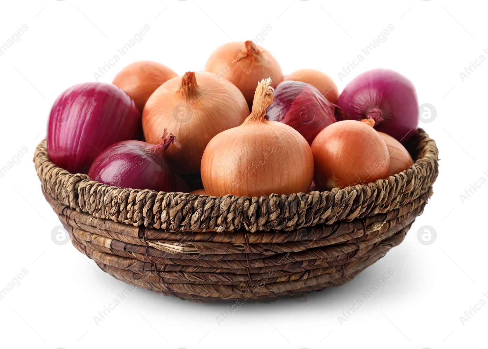 Photo of Basket full of onion bulbs isolated on white