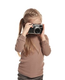 Photo of Fashion concept. Stylish girl with camera on white background