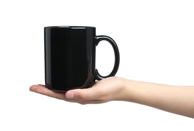 Photo of Woman holding black mug on white background, closeup