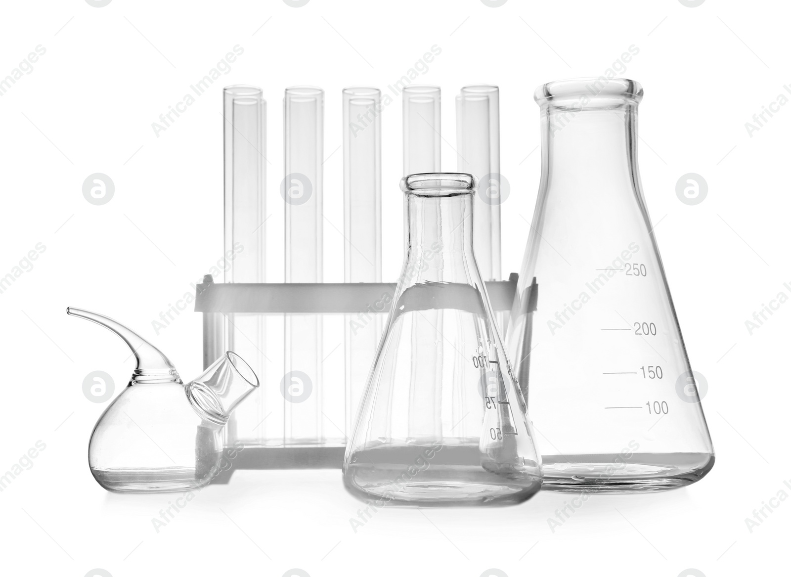 Photo of Set of empty laboratory glassware on white background