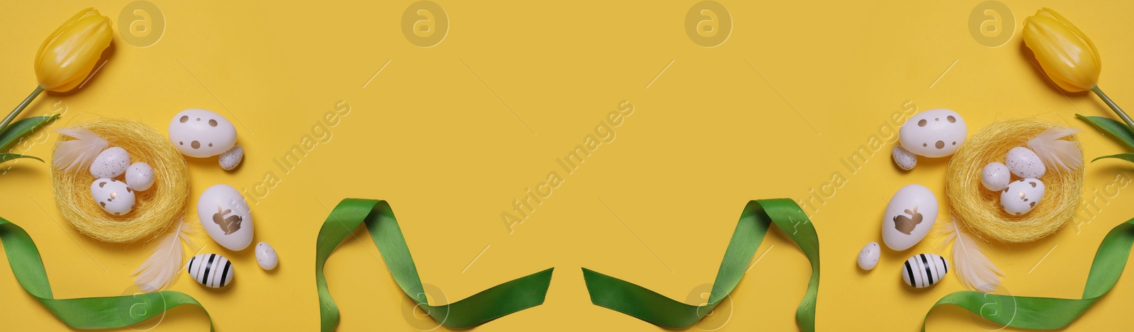 Image of Flat lay composition with decorated Easter eggs and flowers on yellow background, space for text. Banner design