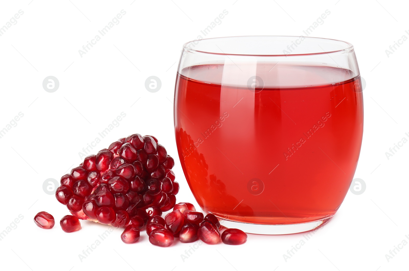 Photo of Refreshing pomegranate juice in glass and seeds isolated on white