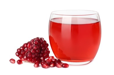 Photo of Refreshing pomegranate juice in glass and seeds isolated on white