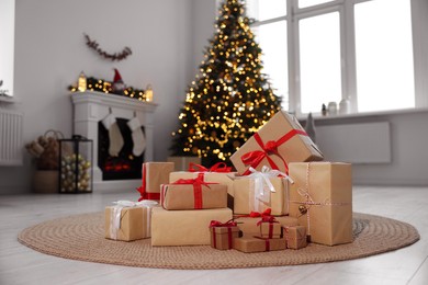 Many different gift boxes and Christmas decor in living room