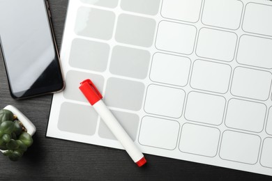 Timetable. Planner, felt pen, smartphone and houseplant on black wooden table, top view