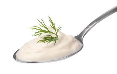 Photo of Delicious sour cream with dill in spoon on white background