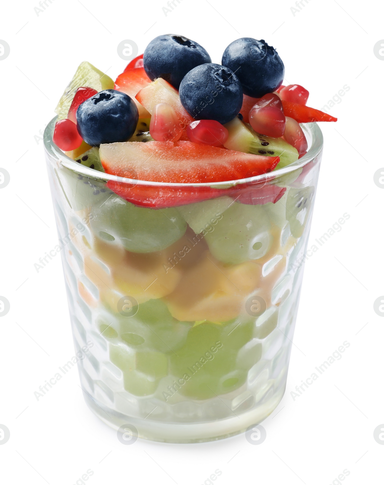 Photo of Healthy breakfast. Delicious fruit salad in glass isolated on white