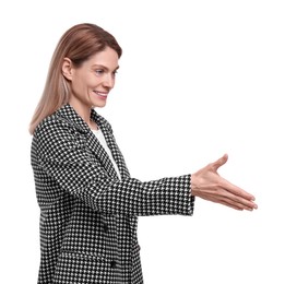 Beautiful happy businesswoman in suit giving handshake on white background