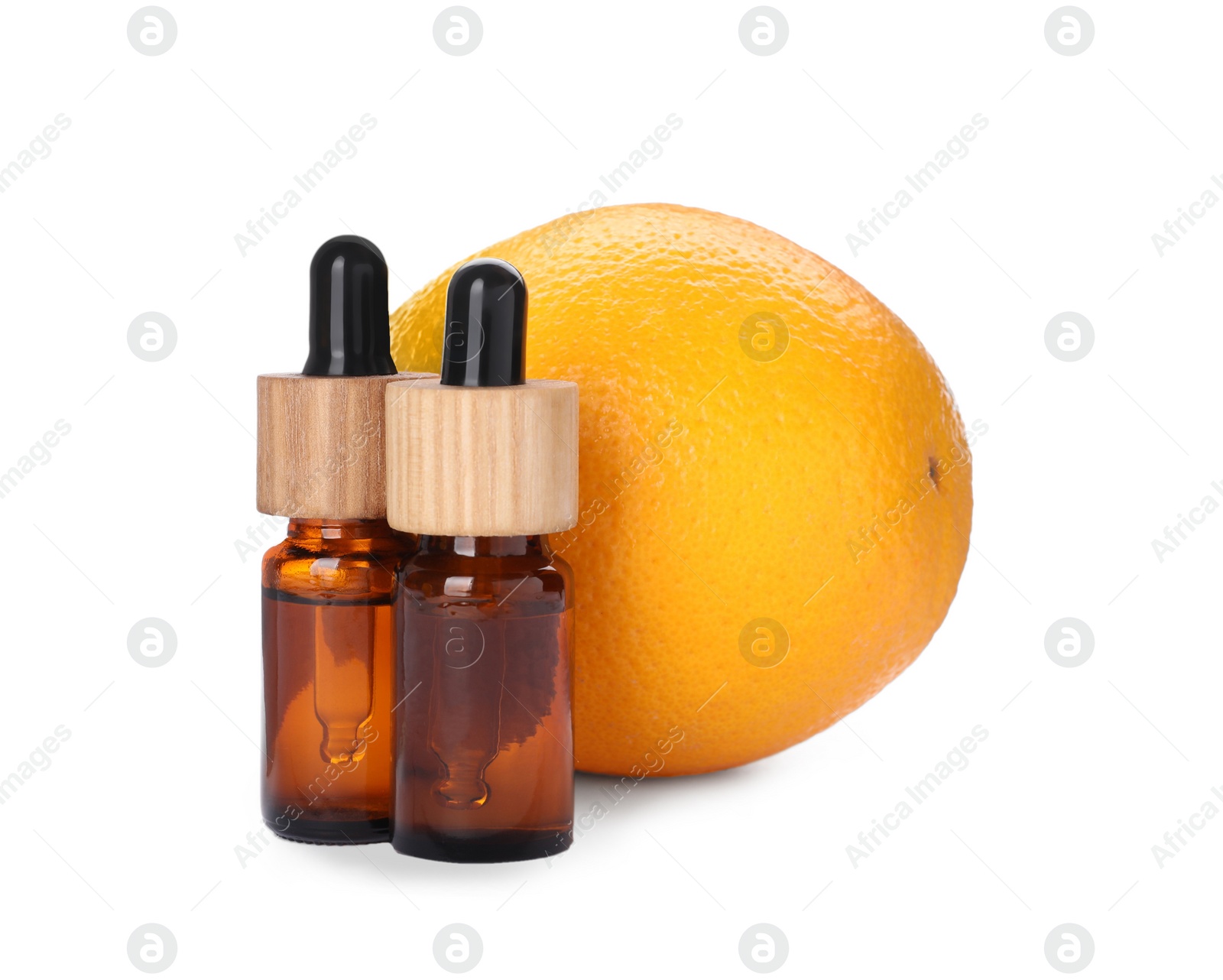 Photo of Bottles of citrus essential oil and fresh orange isolated on white