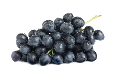 Photo of Bunch of fresh ripe juicy dark blue grapes isolated on white