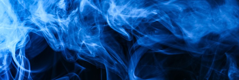 Image of Blue smoke on black background, closeup. Banner design